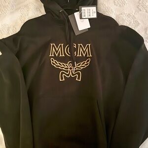 MCM Black Hoodie with Gold Emblem
